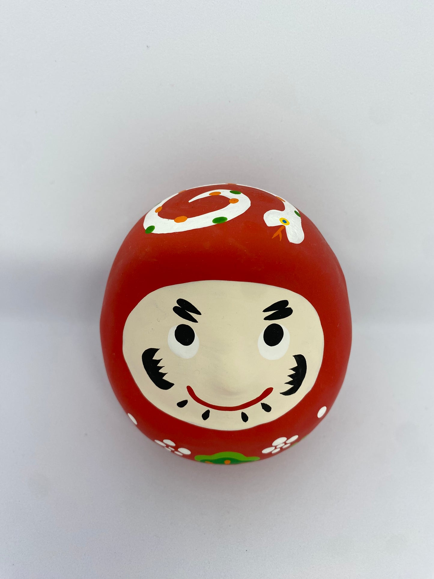 Daruma con hebi, Cerámica Seto. Gangu Koubou